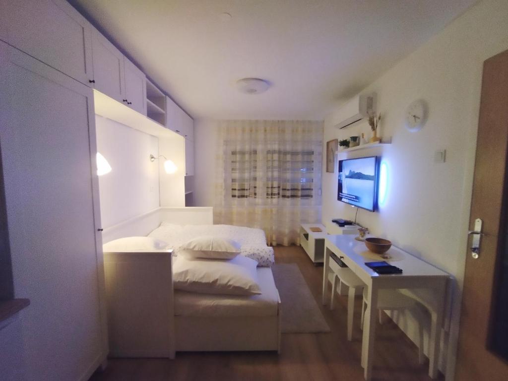 Katil atau katil-katil dalam bilik di Fenix studio apartment, Zagreb