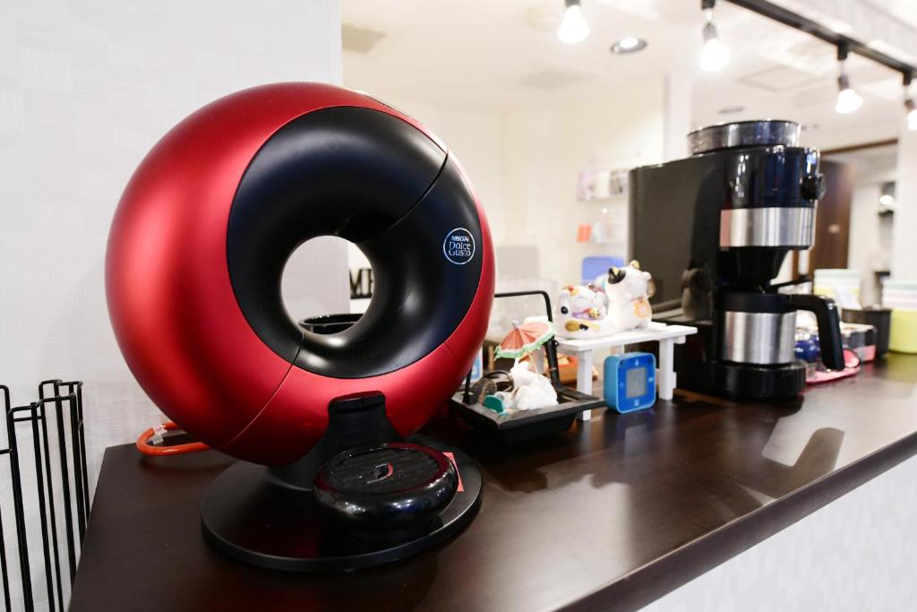 Příslušenství pro přípravu čaje a kávy v ubytování 無料wi-fi JING HOUSE 秋葉原 電動自転車レンタル