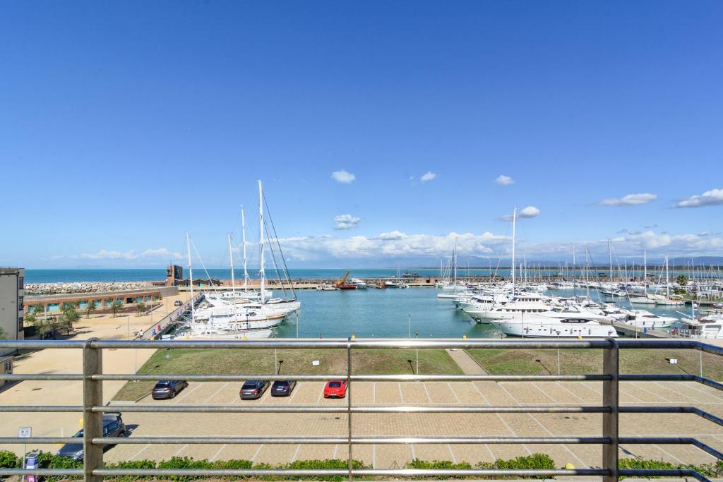a view of a marina with boats in the water at L'incanto Di Boccadarno in Marina di Pisa