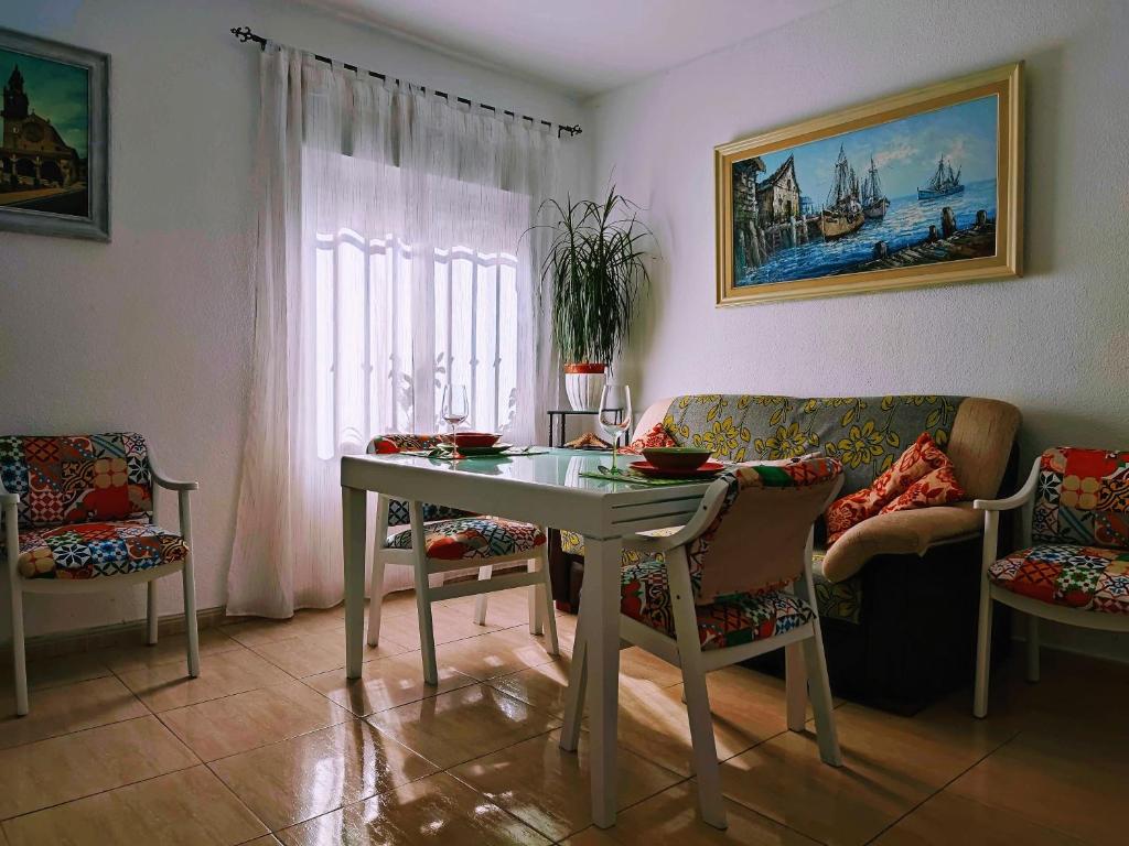 A seating area at Apartamento La flor de Mayo