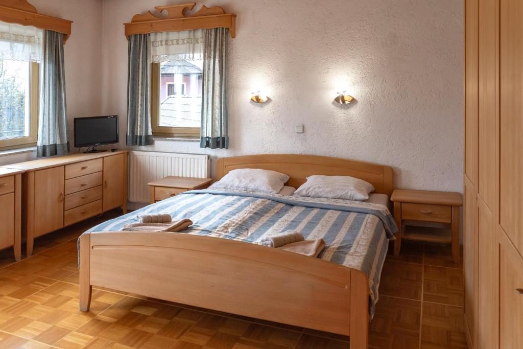 Postel nebo postele na pokoji v ubytování Gostišče Marin Miler