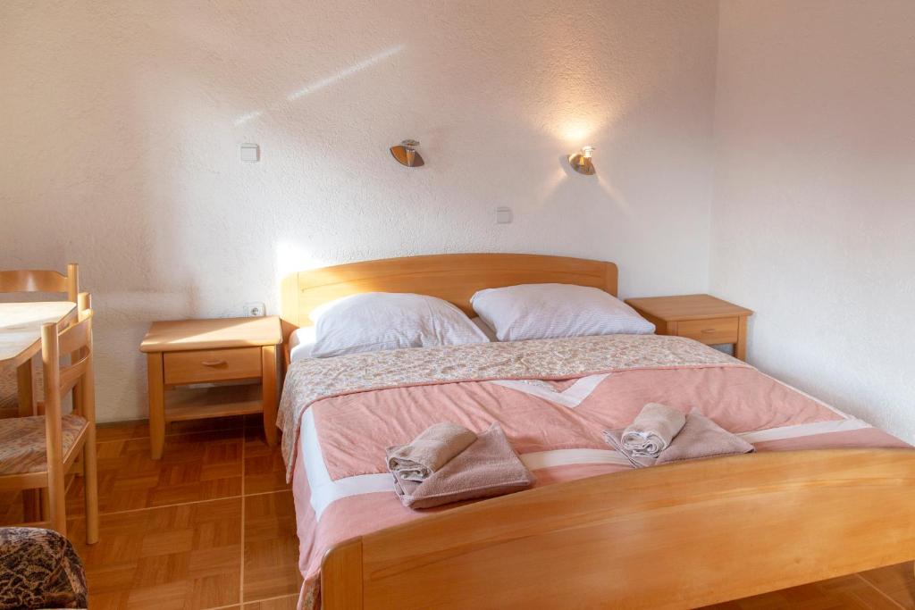 Postel nebo postele na pokoji v ubytování Gostišče Marin Miler