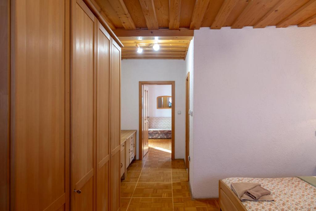 Postel nebo postele na pokoji v ubytování Gostišče Marin Miler