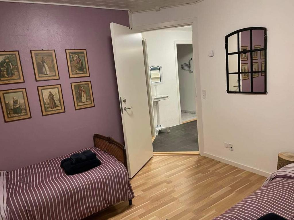 Postel nebo postele na pokoji v ubytování Topagergaard