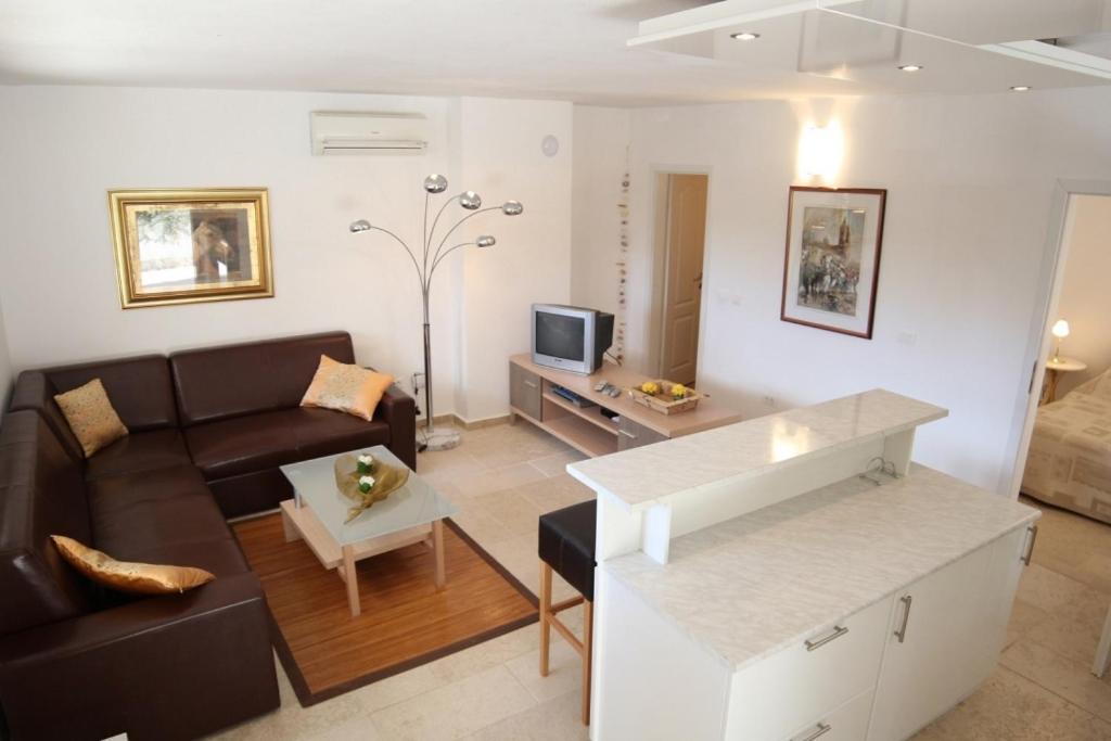 Televízia a/alebo spoločenská miestnosť v ubytovaní Guesthouse Rovinj (4285)