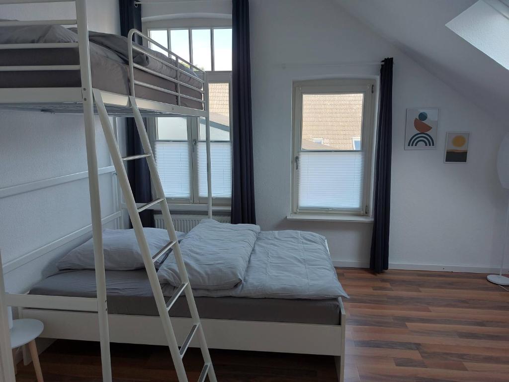 Postel nebo postele na pokoji v ubytování Stadthaus mit Dachterrasse