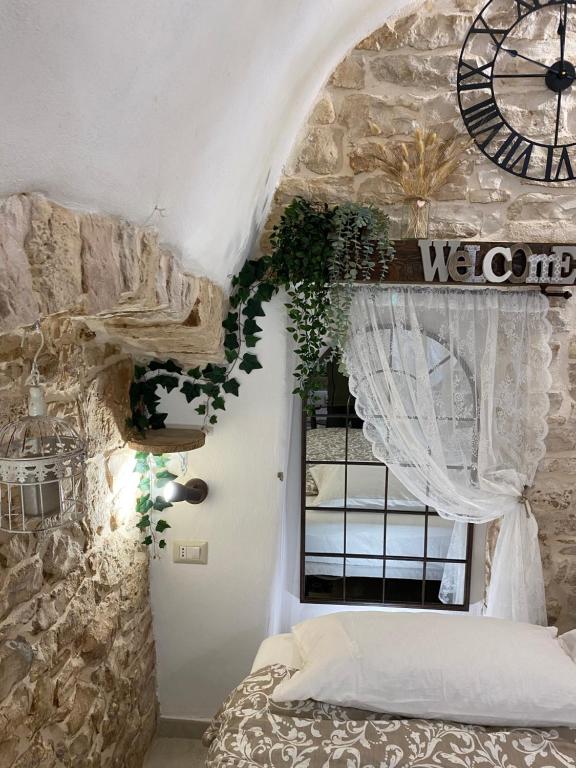 Postel nebo postele na pokoji v ubytování Domus Klara