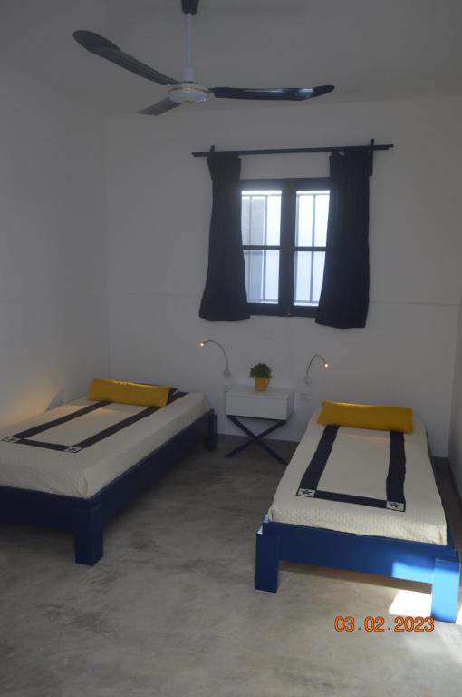 Postel nebo postele na pokoji v ubytování LA VELA