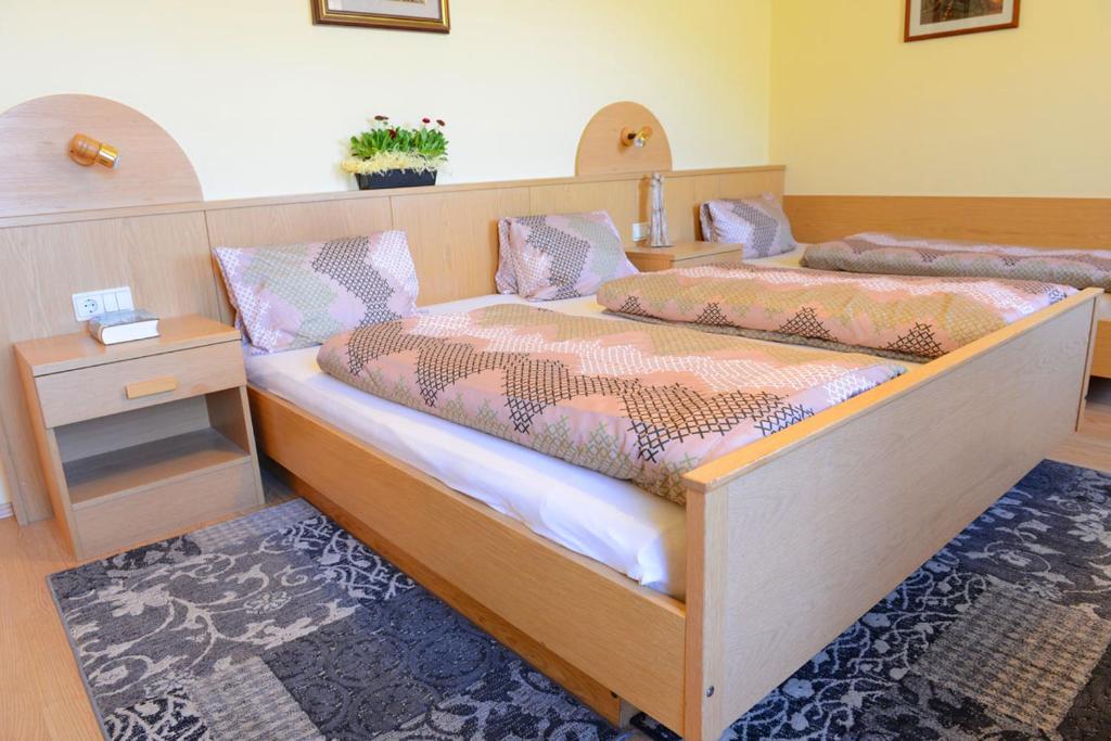 Postel nebo postele na pokoji v ubytování Brunnerhof