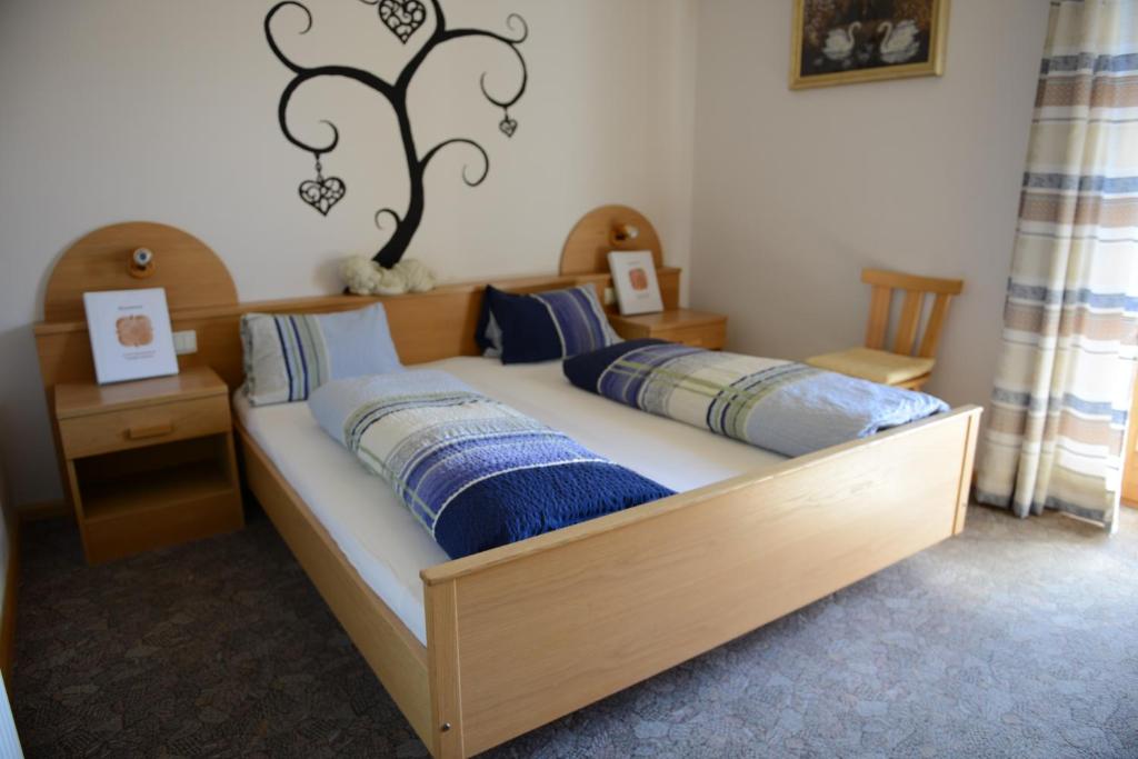 Postel nebo postele na pokoji v ubytování Brunnerhof