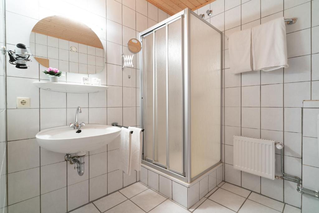 Een badkamer bij Hotel Deis