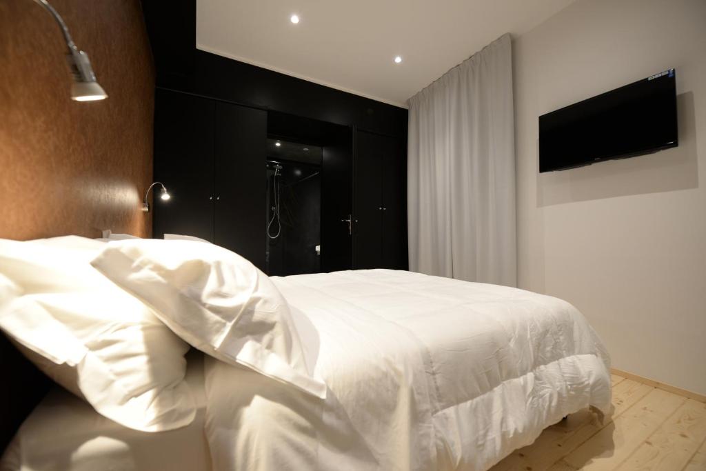 TV a/nebo společenská místnost v ubytování Albergo Ristorante Trieste Boves