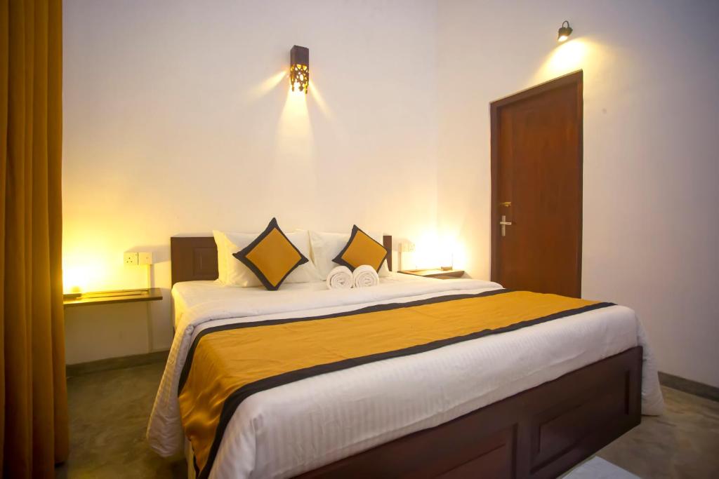 Postel nebo postele na pokoji v ubytování Villa Nook Serene
