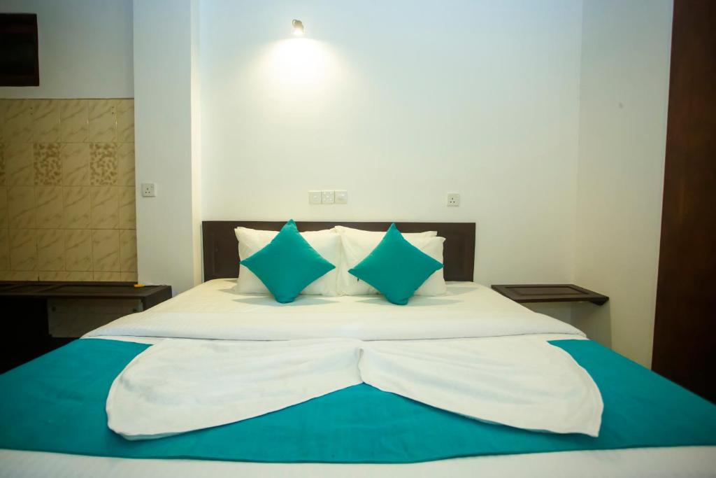 Postel nebo postele na pokoji v ubytování Villa Nook Serene