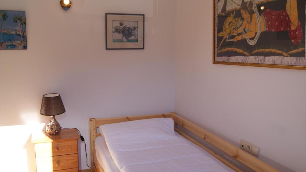 Postel nebo postele na pokoji v ubytování Soldeu Paradis Tarter Mig