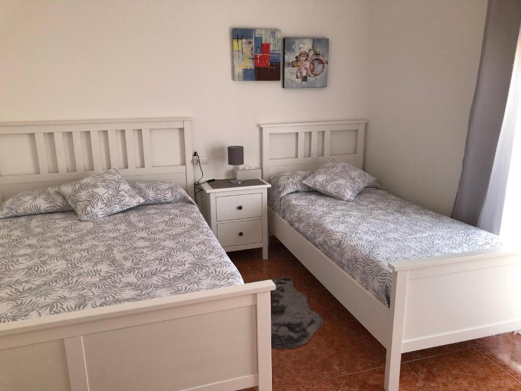 Posteľ alebo postele v izbe v ubytovaní Señorin del Mar