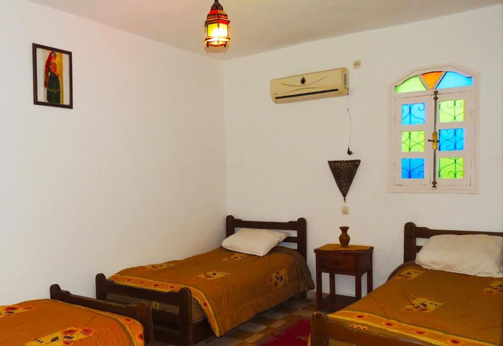 Letto o letti in una camera di Riad Freija-TAROUDANT