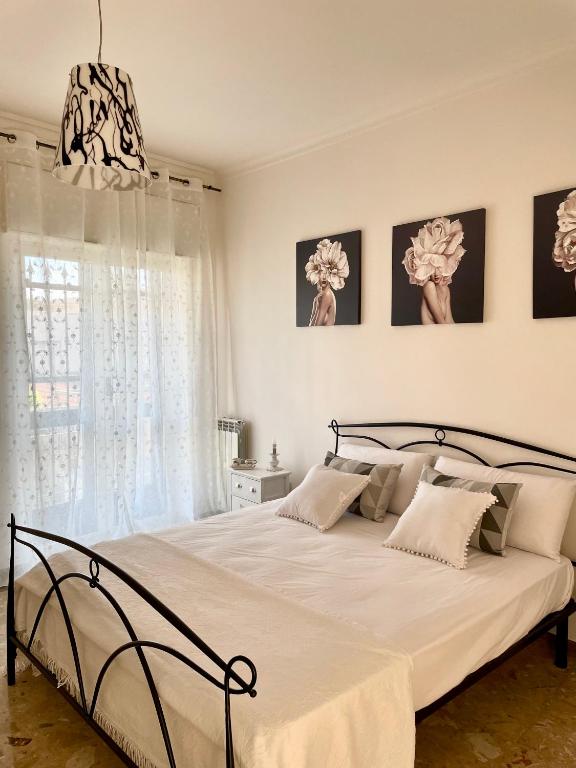 Postel nebo postele na pokoji v ubytování Casa De Curtis