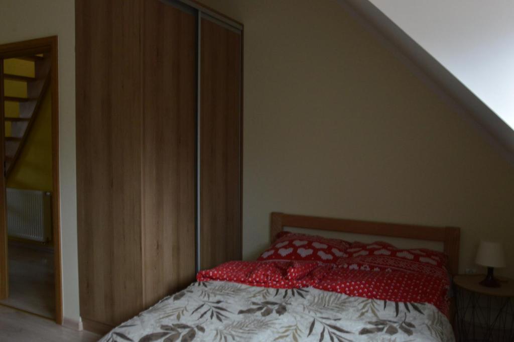 Posteľ alebo postele v izbe v ubytovaní Apartamenty Nad Górską Rzeką