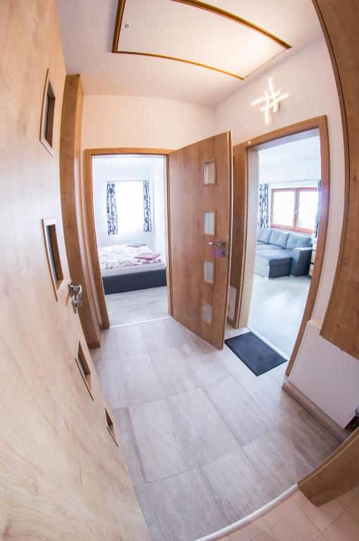 Postel nebo postele na pokoji v ubytování Apartmán Benecko 213