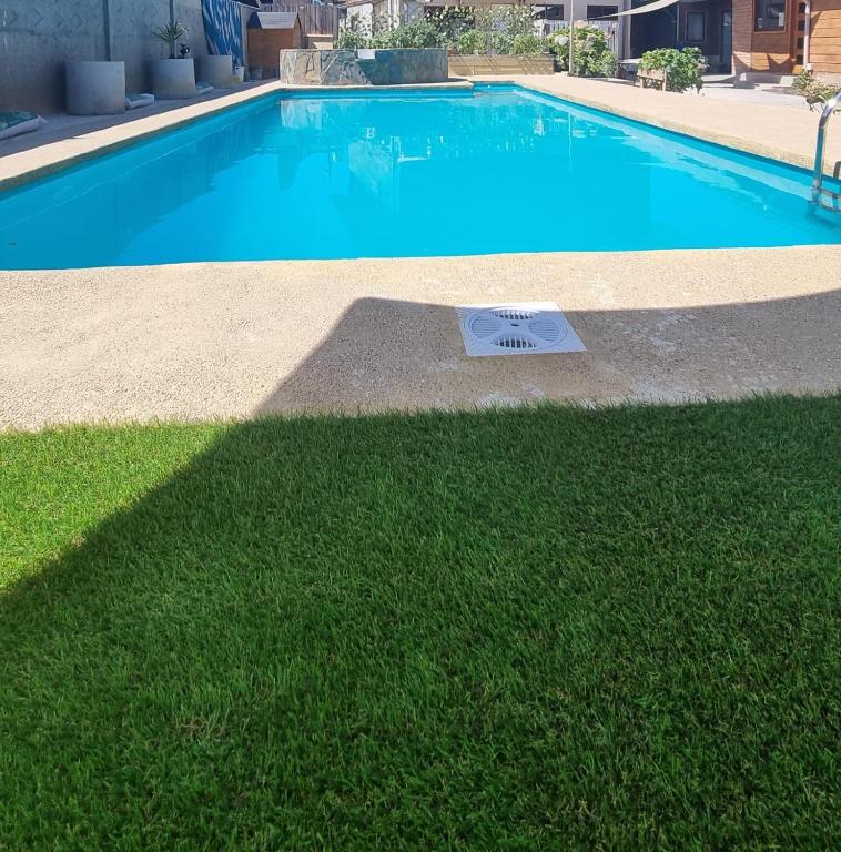 Bazén v ubytování Apart Hotel Antu de Villarrica nebo v jeho okolí
