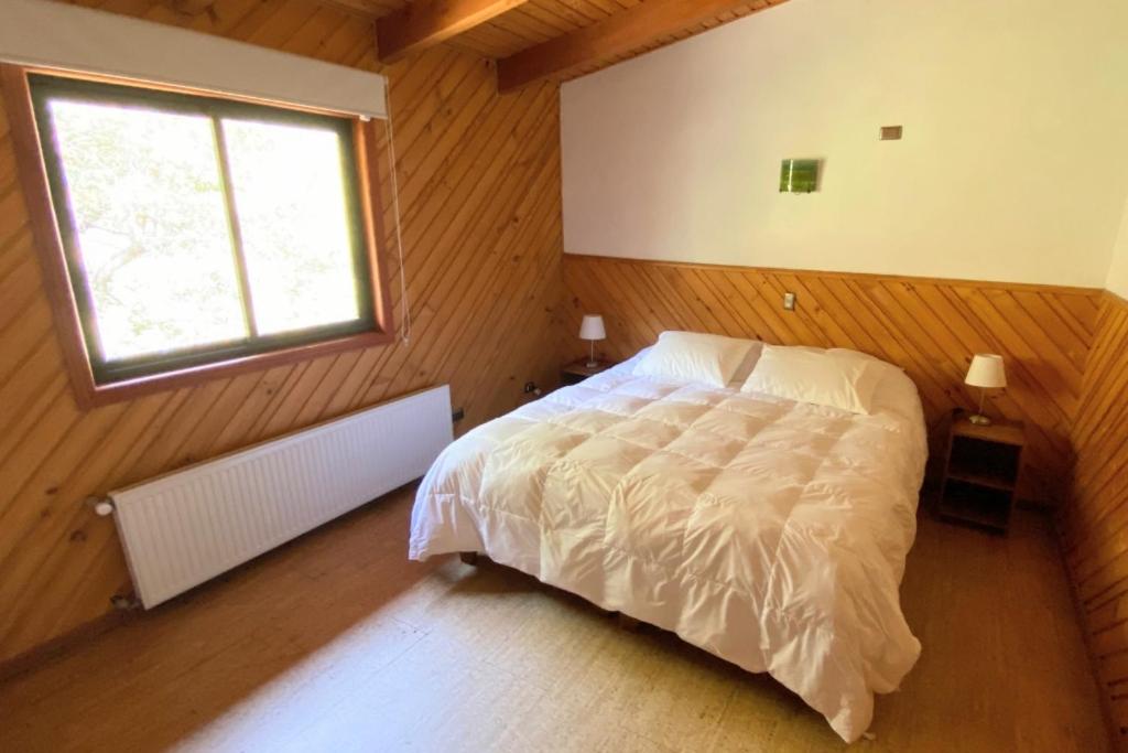 Letto o letti in una camera di MI Lodge Las Trancas Hotel & Spa