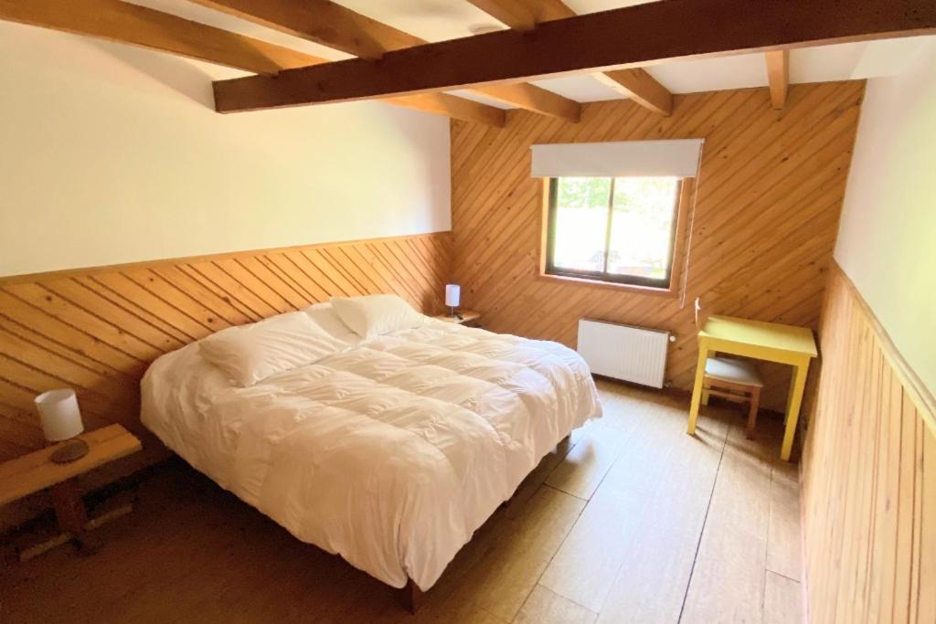 Letto o letti in una camera di MI Lodge Las Trancas Hotel & Spa
