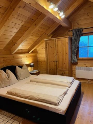 Ένα ή περισσότερα κρεβάτια σε δωμάτιο στο Berg Chalet 303