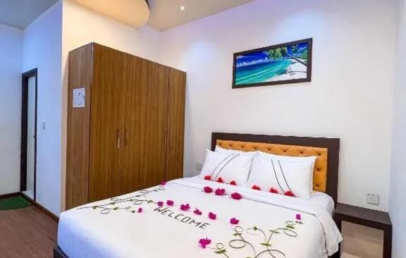 Letto o letti in una camera di Sunview Residence