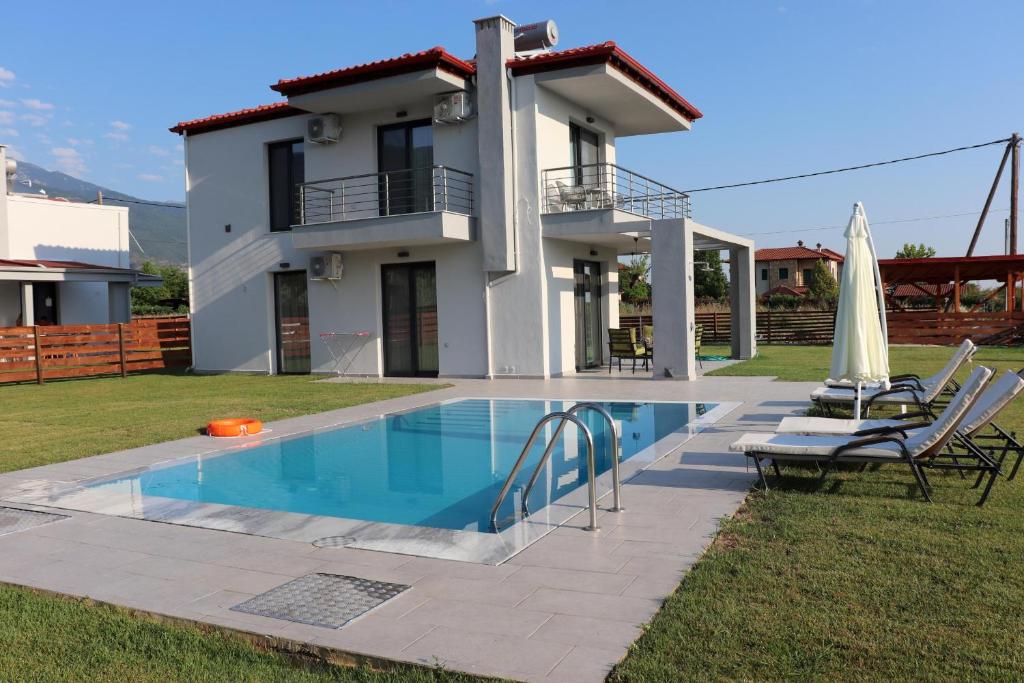 The swimming pool at or close to OLYMPUS Paradise 6