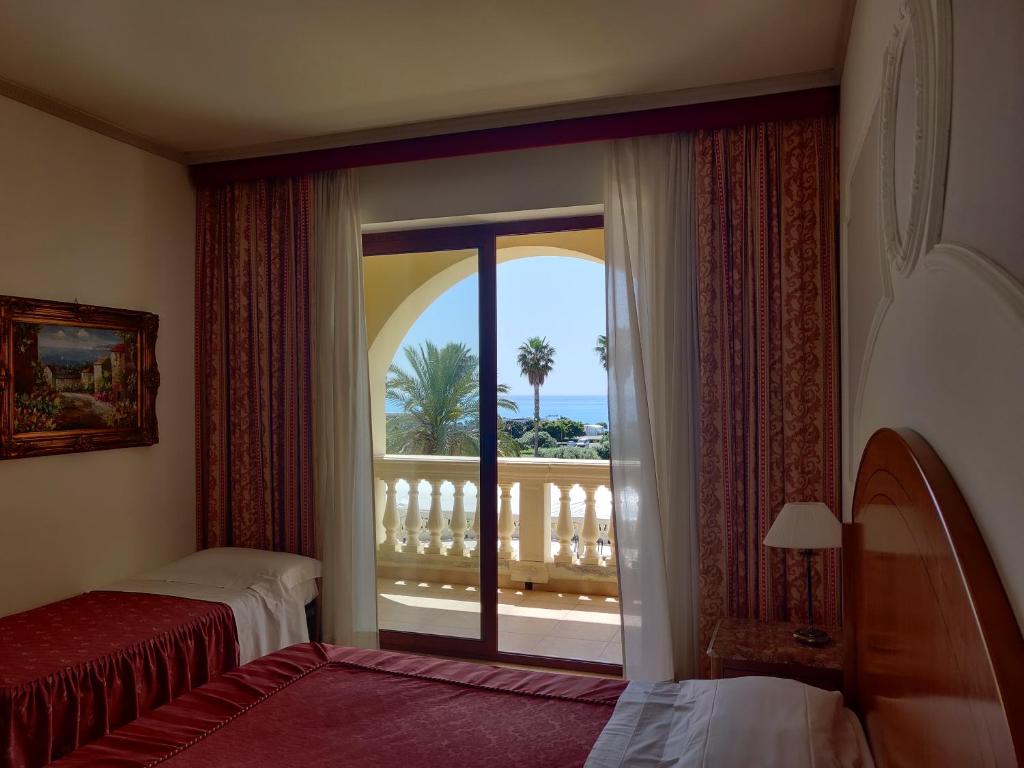 Postelja oz. postelje v sobi nastanitve Parco dei Principi Hotel