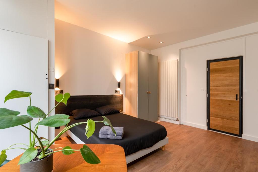 Część wypoczynkowa w obiekcie Appartement Le Médicis - 2 chambres