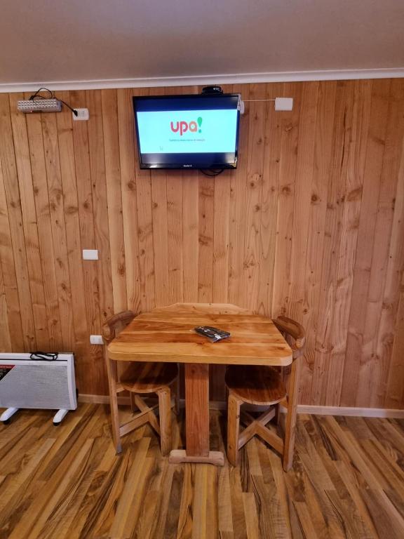 TV a/nebo společenská místnost v ubytování Apart Hotel Antu de Villarrica