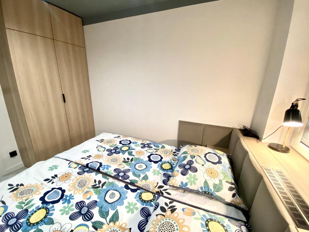 Posteľ alebo postele v izbe v ubytovaní Apartamenty Marea Rentals Bałtyk Ustka