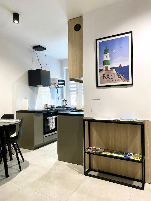 Kuchyňa alebo kuchynka v ubytovaní Apartamenty Marea Rentals Bałtyk Ustka