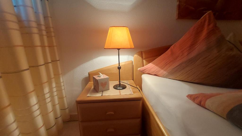 Postel nebo postele na pokoji v ubytování Ferienwohnung Zum Weinberg