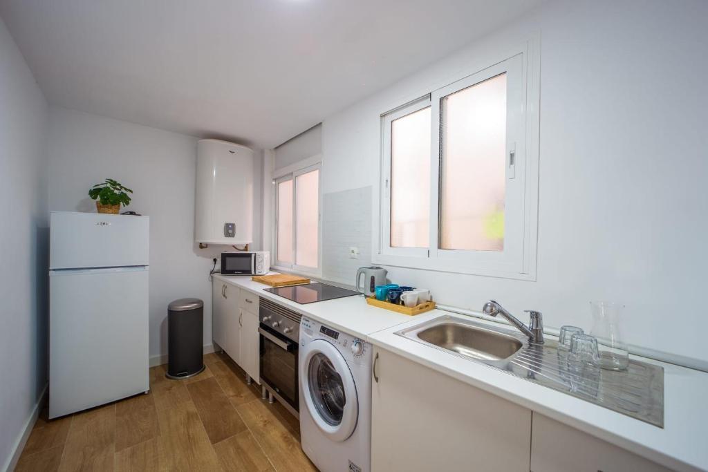 Kuchyňa alebo kuchynka v ubytovaní Luxury Casa del Sol Malaga centro