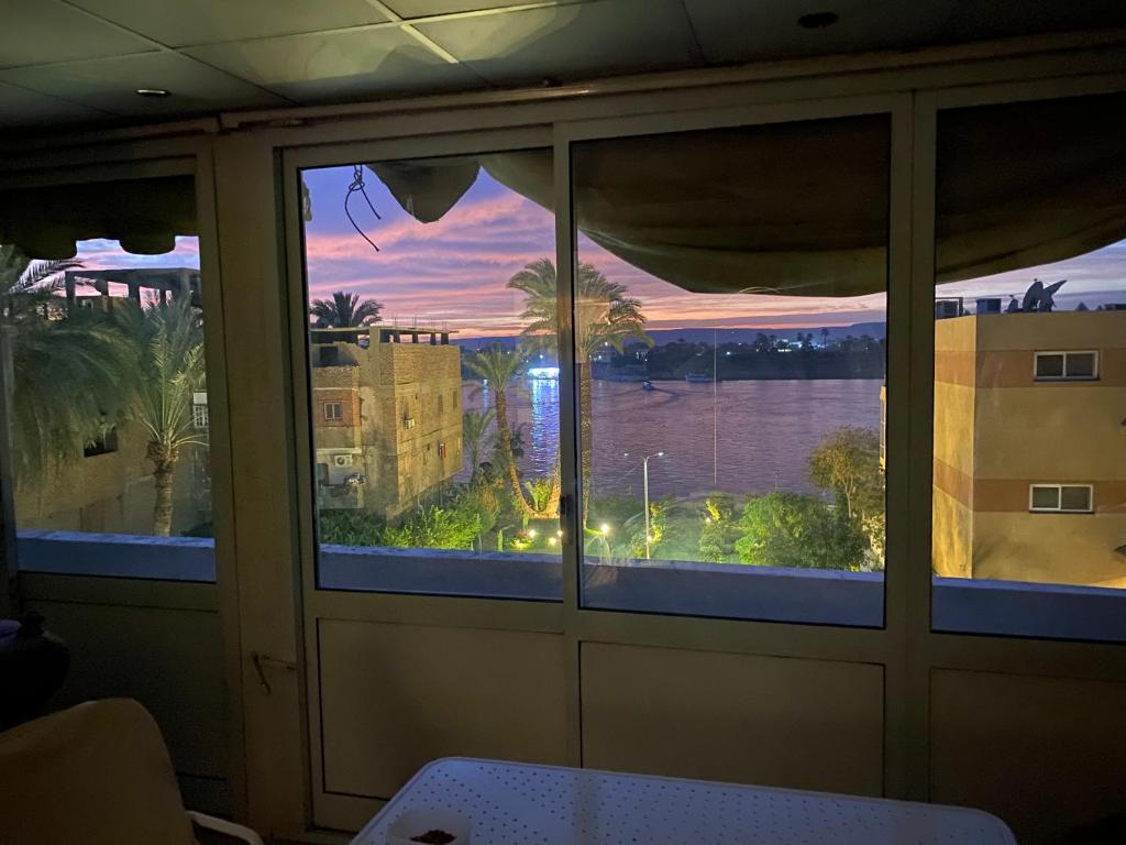 A balcony or terrace at East Luxor Apartments with Nile views