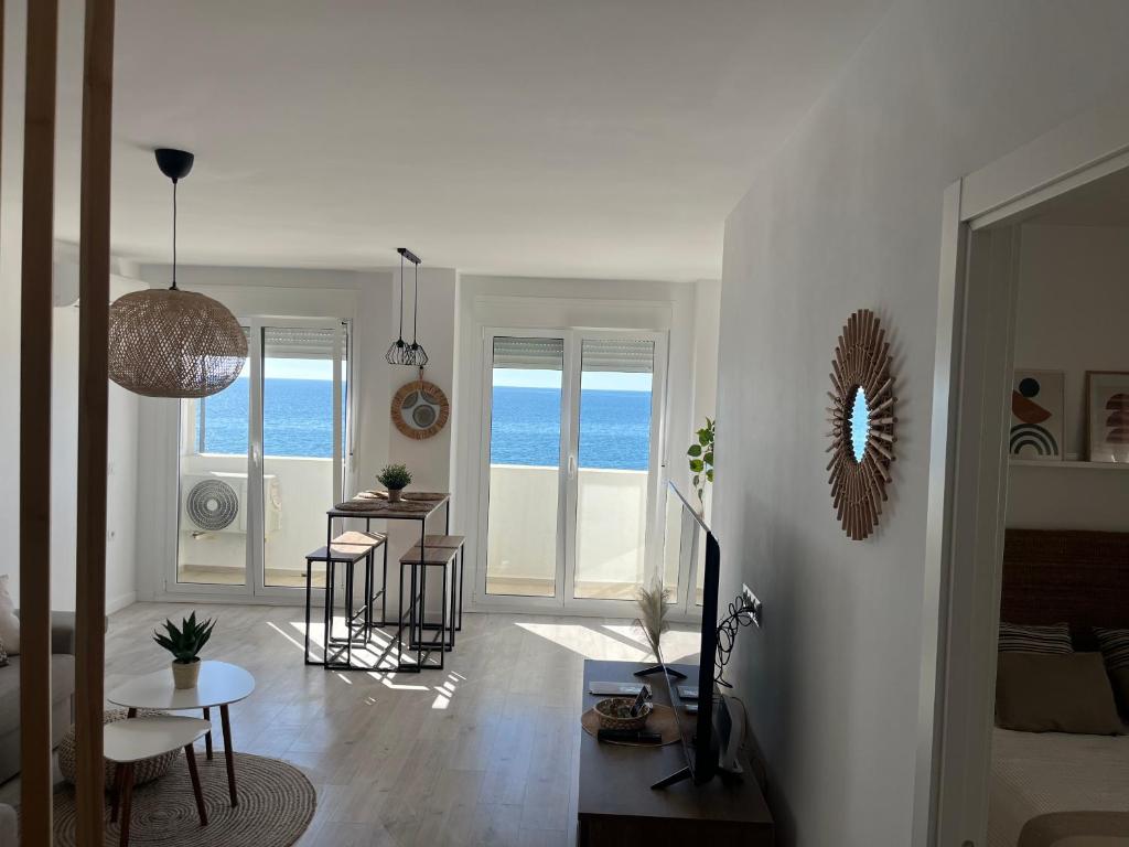Televízia a/alebo spoločenská miestnosť v ubytovaní PLAYA BALERMA