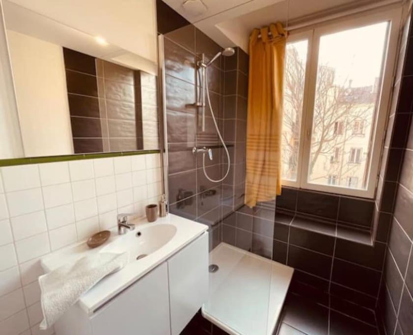 Kúpeľňa v ubytovaní Bel Appart' 4 chambres duplex Durafour