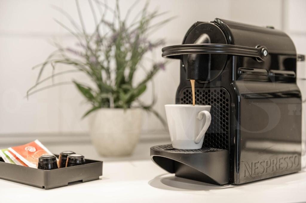 Coffee and tea making facilities at Cozy apartment with parking in the center by REMS