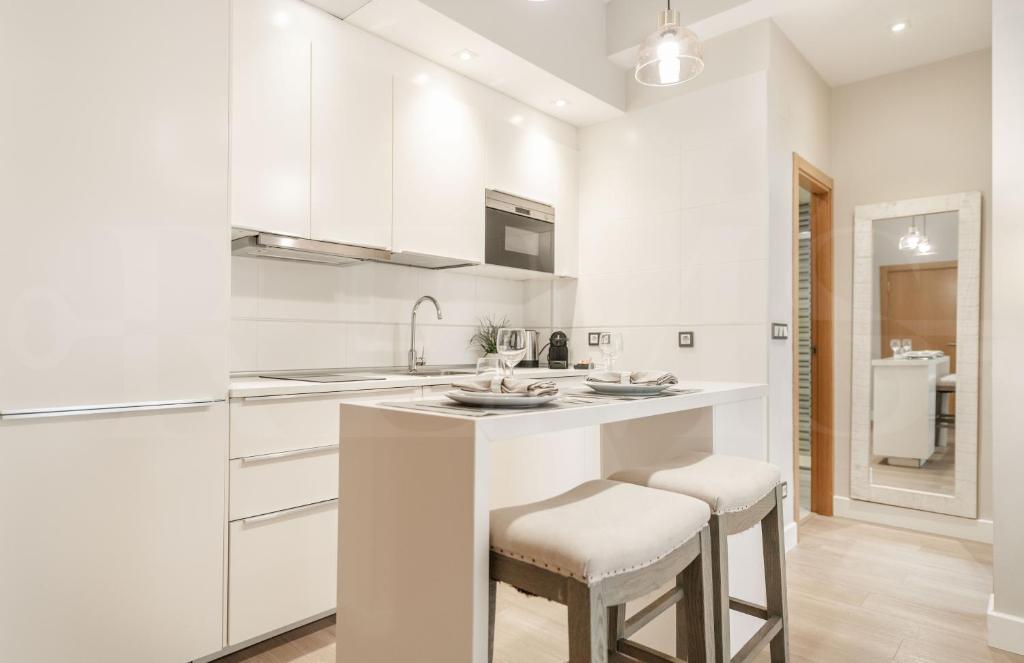 A kitchen or kitchenette at Cozy apartment with parking in the center by REMS