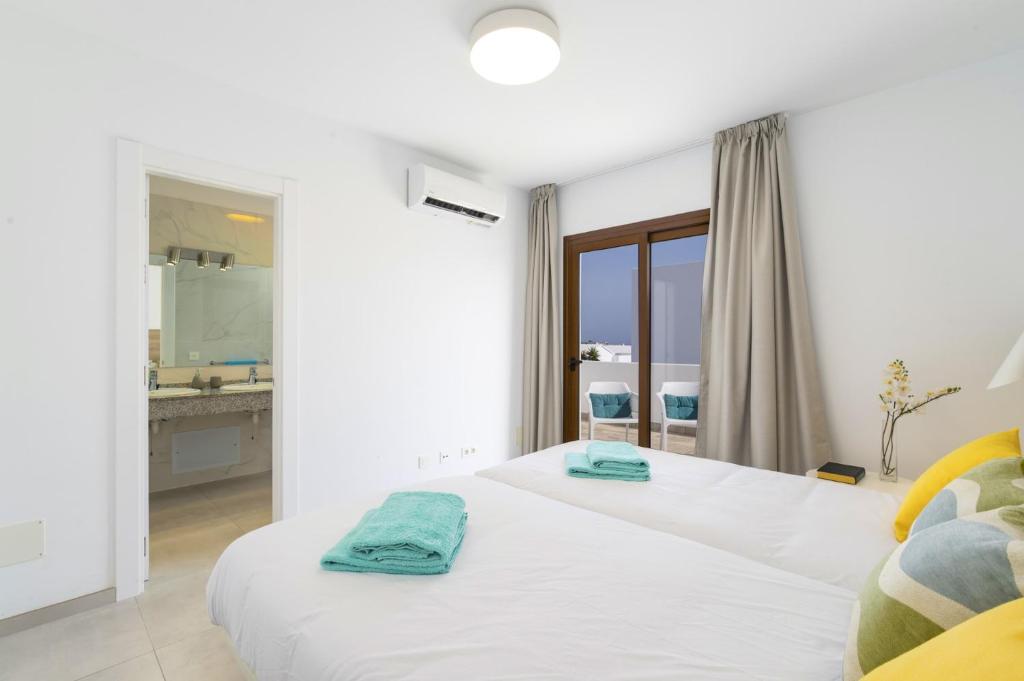 Postel nebo postele na pokoji v ubytování Villa Samdura by Villa Plus