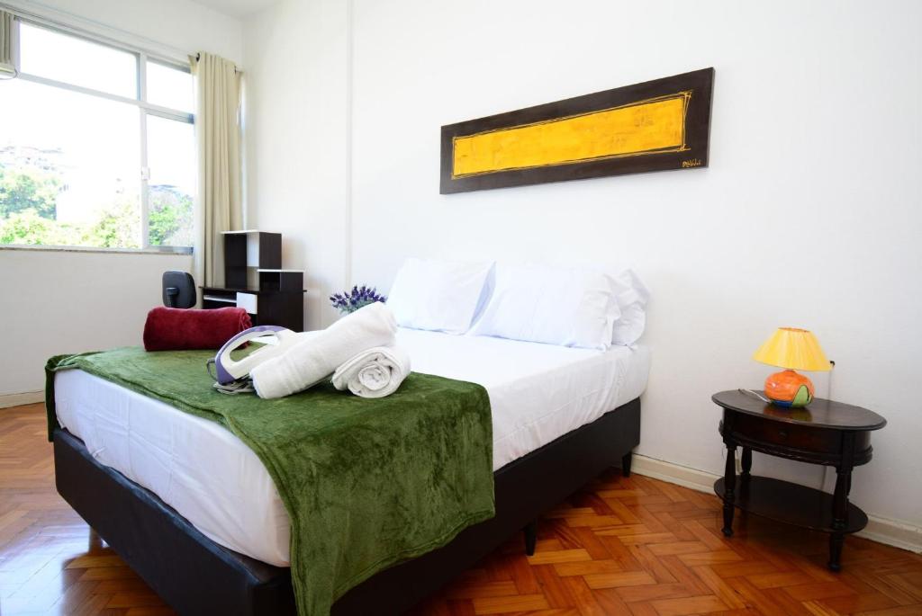 Cama o camas de una habitación en Rio Histórico - Glória, Conforto e Praticidade