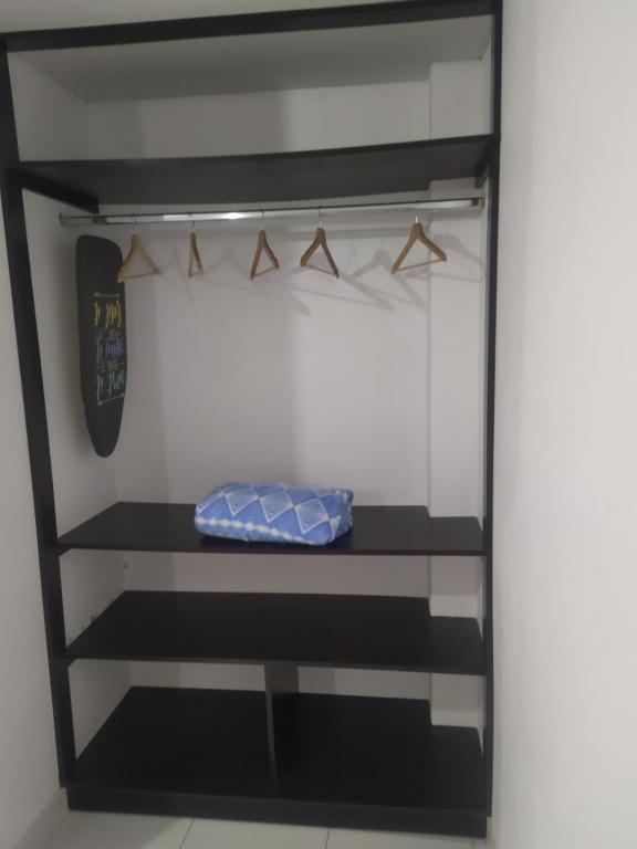 Palanda nebo palandy na pokoji v ubytování Ambigua Hospedaje