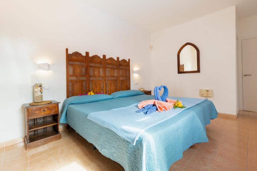 A bed or beds in a room at Casa Garcia