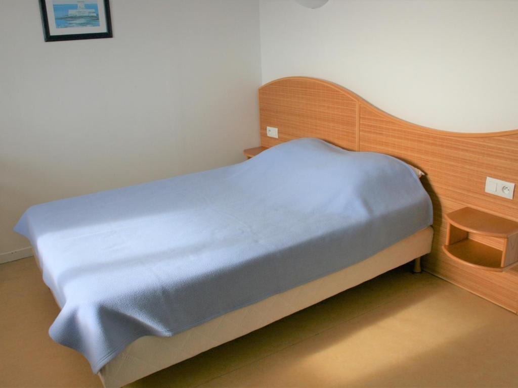 Llit o llits en una habitaci&oacute; de Appartement La Tranche-sur-Mer, 3 pi&egrave;ces, 4 personnes - FR-1-22-163