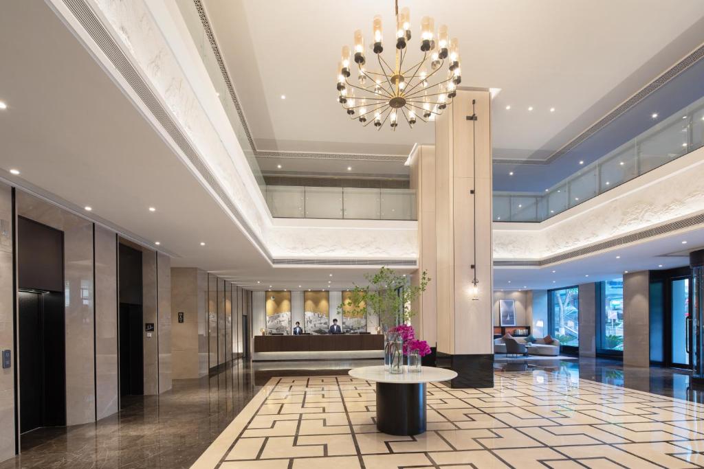 Posezení v ubytování Xin'an Yihao Hotel - Near Xiamen Railway Station, near Vientiane City, minibar is free