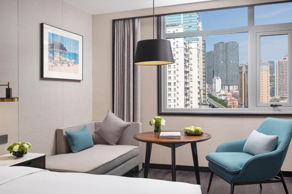 Posezení v ubytování Xin'an Yihao Hotel - Near Xiamen Railway Station, near Vientiane City, minibar is free