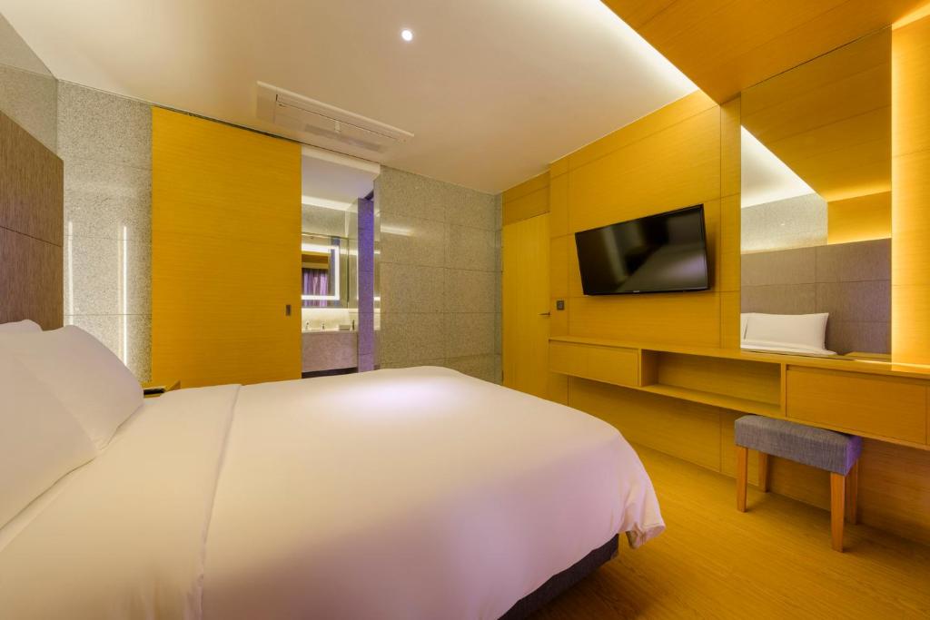 TV a/nebo společenská místnost v ubytování STANFORD Hotel & Resort Jeju